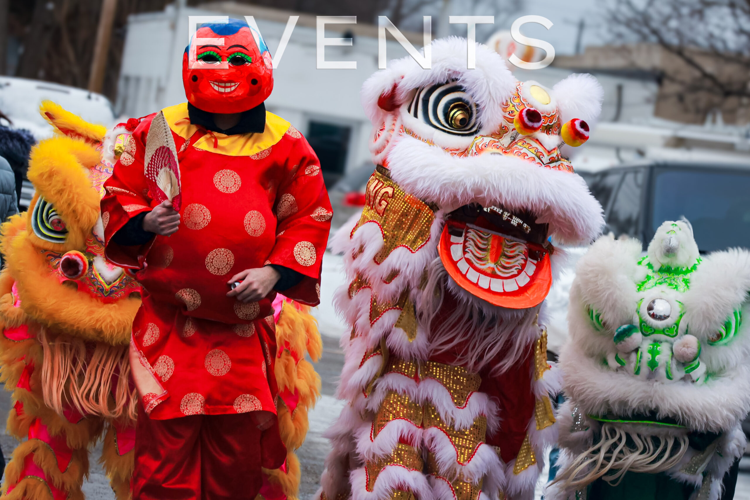 lion dances with “Ong Dia” (the spirit of the earth) in the middle